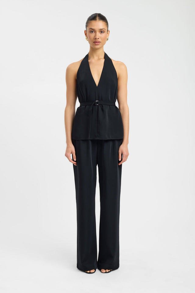 Showcasing the Maria Low Back Top womens blouse in black with halter neckline, v-neck, fitted silhouette and sleeveless design front