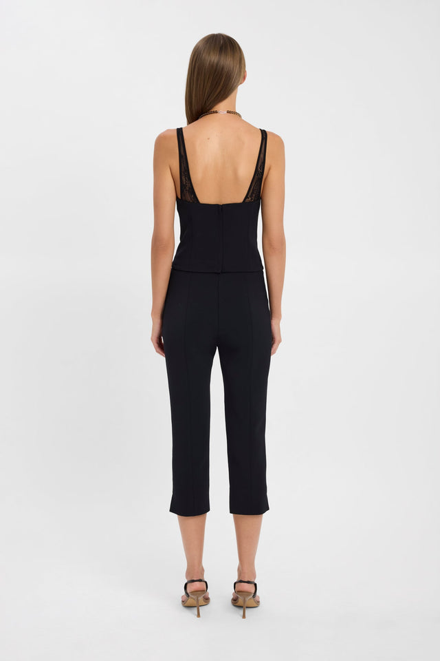 Crafted with the Astra Lace Top womens-blouse in black with fitted sweetheart neckline and sleeveless cut back