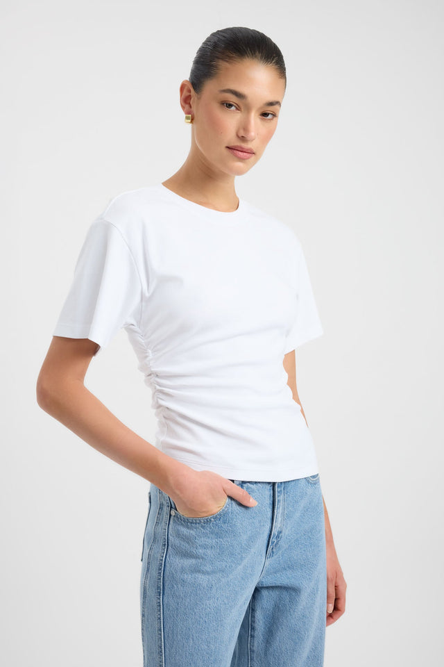 Featuring the Nova Tee womens-blouse in white with fitted round neckline and short sleeves side