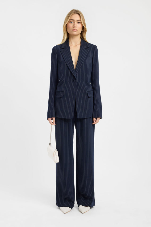Showcasing the Oslo Cinched Blazer in women's coats and jackets featuring full sleeves and regular length in navy with white pinstripes front