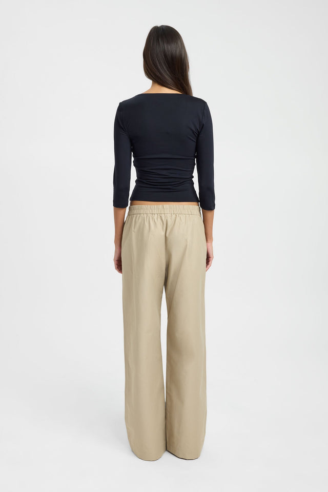 Crafted with the Lina Top womens-blouse in fitted black design featuring sweetheart neckline and three-fourth sleeves back