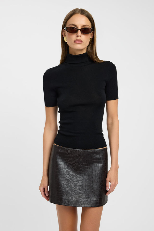 Shop the Jackson Roll Neck Top womens blouse featuring high-neck, black solid print, fitted silhouette, and short straight sleeves front